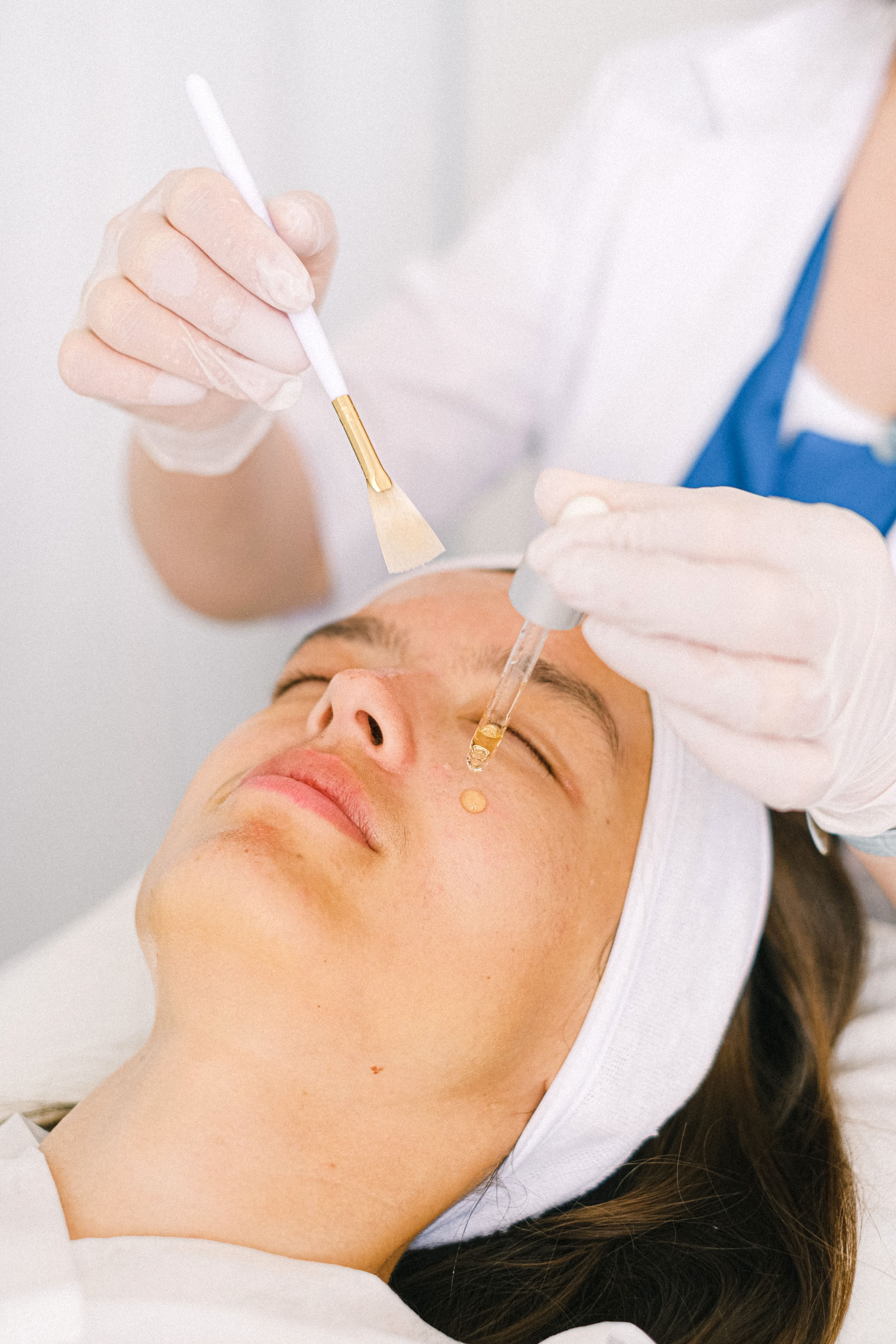 Facial skincare treatment in a bright treatment room